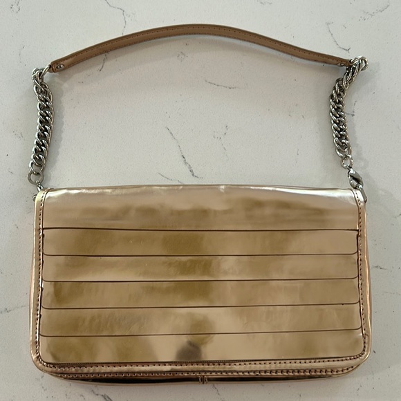 Cole Haan Handbags - Maria Sharapova by Cole Haan rose gold clutch with detachable chain